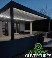 Poseur de pergola bioclimatique adossée en Isère