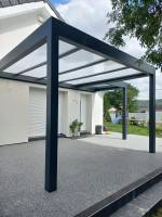 Pose d'une pergola sur une entrée de maison dans le 38
