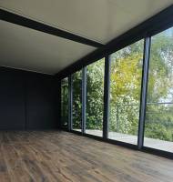 Véranda aluminium toit plein en Isère